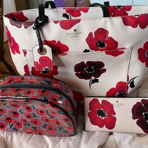 Kate Spade Purse and Wallet. Along with makeup bag.